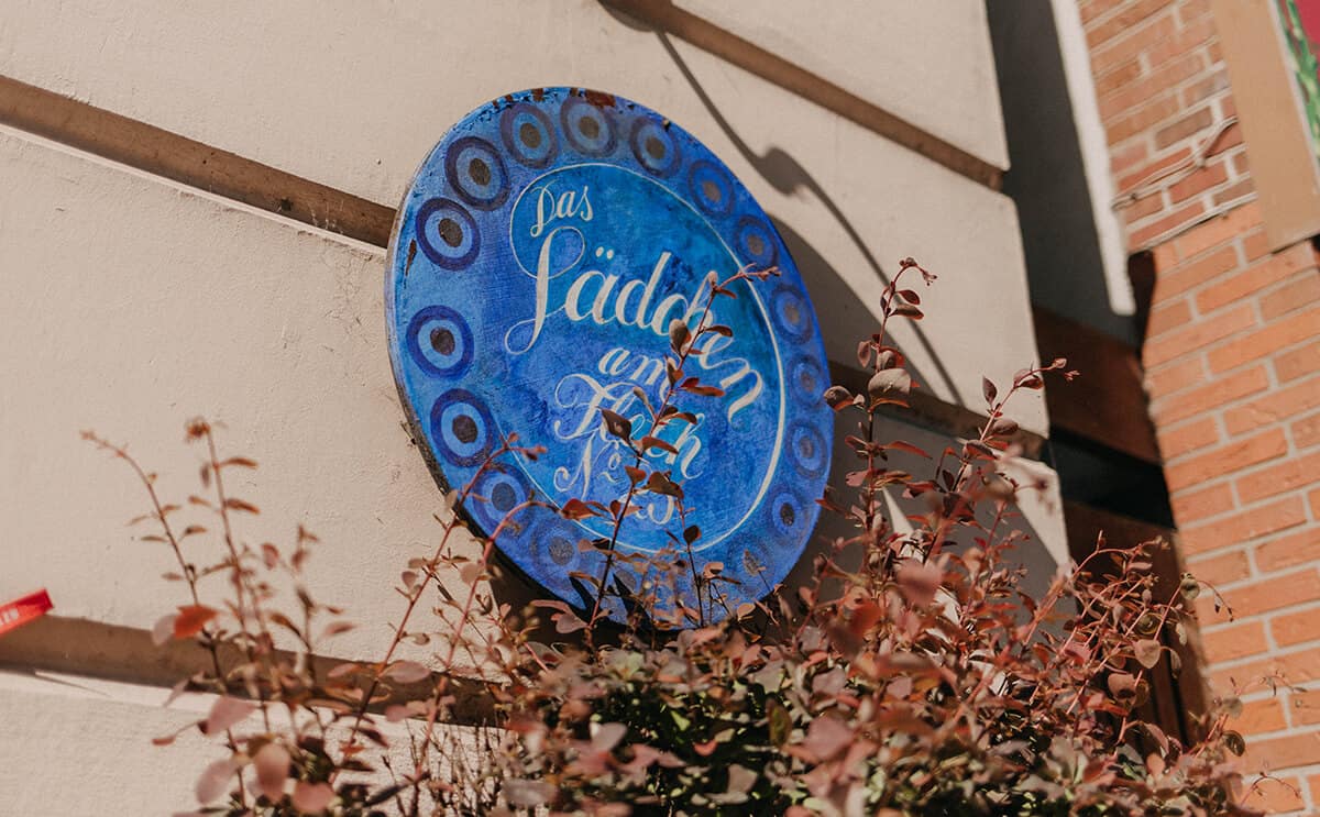 Schild Das Lädchen am Fleth